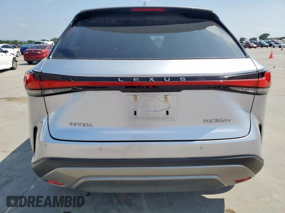 2023 Lexus RX 350 with VIN JTJCHMAA7P2002344, listed as a Copart auction lot 58018015 with 18,551 mi miles and Salvage title. Bid and sale history available at DreamBid. Image 6.