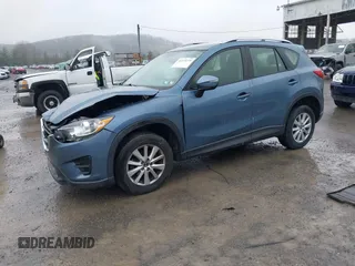 2016 Mazda CX-5 Sport with VIN JM3KE4BY5G0727608, listed as a IAAI auction lot 41975279 with 95,817 mi miles and . Bid and sale history available at carsss.com. Image 17.