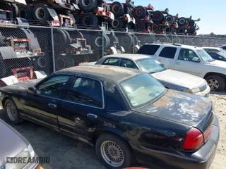 1998 Mercury Grand Marquis LS with VIN 2MEFM75W8WX680422, listed as a IAAI auction lot 41767379 with 1 mi miles. Bid and sale history available at carsss.com. Image 3.