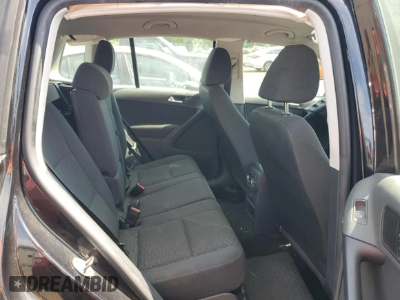 2013 Volkswagen Tiguan SE z VIN WVGBV3AX9DW603521, wystawiony jako Copart lot #59406465 z przebiegiem 133 647 mil mil oraz Szkoda całkowita • Salvage title. Historia ofert i sprzedaży dostępna na DreamBid. Obrazek 10.
