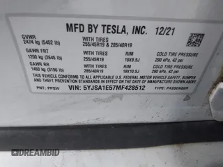 2021 Tesla Model S Long Range with VIN 5YJSA1E57MF428512, listed as a IAAI auction lot 42511020 with 29,611 mi miles and . Bid and sale history available at DreamBid. Image 9.