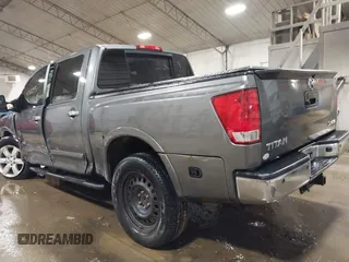 2014 Nissan Titan S with VIN 1N6AA0EC6EN513801, listed as a IAAI auction lot 41762295 with 128,412 mi miles and . Bid and sale history available at DreamBid. Image 3.