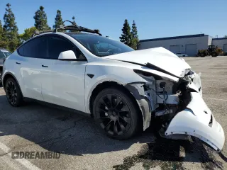 2022 Tesla Model Y Long Range with VIN 7SAYGDEE4NF357428, listed as a Copart auction lot 50345715 with 45,168 mi miles and Salvage Title. Bid and sale history available at carsss.com. Image 4.