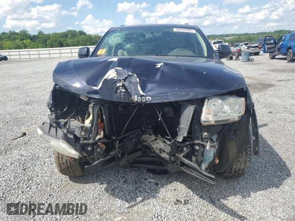 2011 Jeep Grand Cherokee Laredo with VIN 1J4RR4GG7BC515001, listed as a Copart auction lot 56432905 with 143,181 mi miles and Salvage title. Bid and sale history available at DreamBid. Image 5.