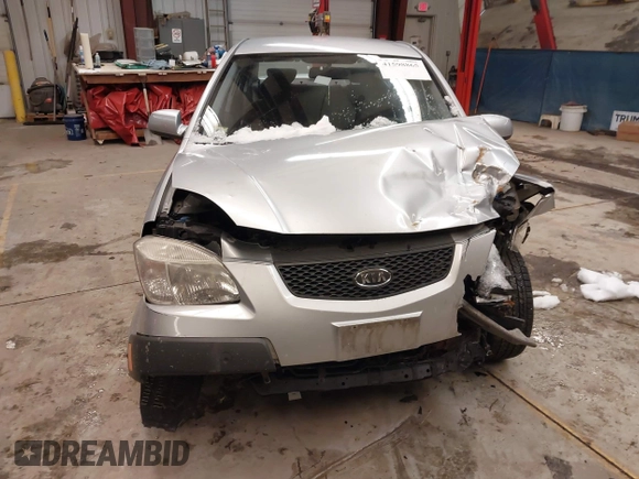 2009 Kia Rio LX with VIN KNADE223596444133, listed as a IAAI auction lot 41598865 with Not Provided miles and . Bid and sale history available at DreamBid. Image 12.