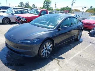 2024 Tesla Model 3 z VIN 5YJ3E1EA4RF735729, wystawiony jako IAAI lot #41964387 z przebiegiem Nie podano mil oraz . Historia ofert i sprzedaży dostępna na DreamBid. Obrazek 2.