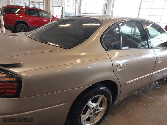 2002 Pontiac Bonneville SE with VIN 1G2HX54K424128538, listed as a IAAI auction lot 41606130 with 147,048 mi miles. Bid and sale history available at carsss.com. Image 14.