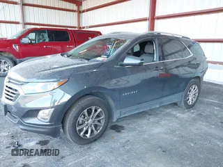 2018 Chevrolet Equinox LT with VIN 2GNAXSEV7J6263151, listed as a IAAI auction lot 40644330 with 136,428 mi miles. Bid and sale history available at carsss.com. Image 2.