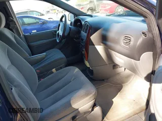 2004 Chrysler Town & Country LX with VIN 2C8GP44R14R510023, listed as a IAAI auction lot 41541652 with 213,273 mi miles. Bid and sale history available at carsss.com. Image 5.