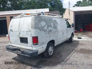 2012 Ford Econoline Cargo Commercial with VIN 1FTNE1EW9CDA86738, listed as a IAAI auction lot 42464315 with 180,322 mi miles and . Bid and sale history available at DreamBid. Image 4.