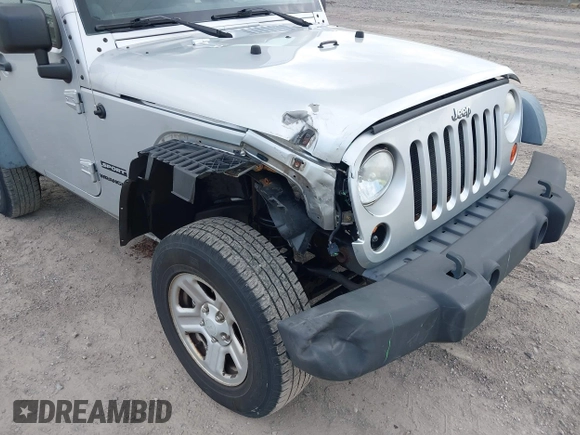 2011 Jeep Wrangler Sport with VIN 1J4AA2D18BL546069, listed as a IAAI auction lot 42139693 with 56,395 mi miles and . Bid and sale history available at carsss.com. Image 6.