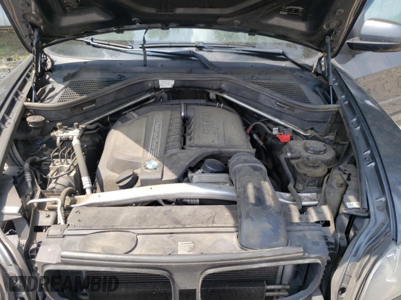 2012 BMW X5 35i z VIN 5UXZV4C55CL753810, wystawiony jako Copart lot #62405565 z przebiegiem 178 504 mil mil oraz Szkoda całkowita • Salvage title. Historia ofert i sprzedaży dostępna na DreamBid. Obrazek 12.