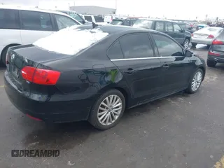 2014 Volkswagen Jetta TDI w/Premium with VIN 3VWLL7AJ3EM276789, listed as a IAAI auction lot 41805737 with 160,500 mi miles and . Bid and sale history available at DreamBid. Image 4.