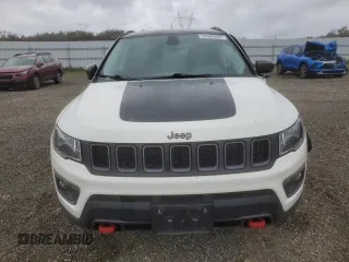 2019 Jeep Compass Trailhawk with VIN 3C4NJDDB4KT790351, listed as a Copart auction lot 48588285 with 67,417 mi miles and Salvage Title. Bid and sale history available at DreamBid. Image 5.