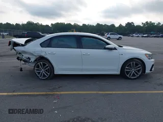 2018 Volkswagen Passat S z VIN 1VWAA7A39JC016259, wystawiony jako IAAI lot #42382550 z przebiegiem 89 143 mil mil oraz . Historia ofert i sprzedaży dostępna na DreamBid. Obrazek 14.