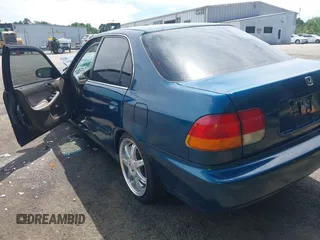 1997 Honda Civic LX z VIN 2HGEJ6671VH574878, wystawiony jako IAAI lot #42332735 z przebiegiem 246 181 mil mil oraz . Historia ofert i sprzedaży dostępna na DreamBid. Obrazek 3.