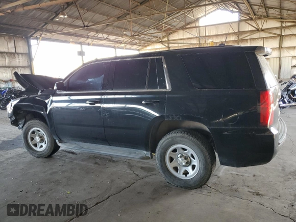 2015 Chevrolet Tahoe Commercial with VIN 1GNSK3EC5FR293350, listed as a Copart auction lot 83570834 with Not provided miles and Salvage title. Bid and sale history available at DreamBid. Image 2.