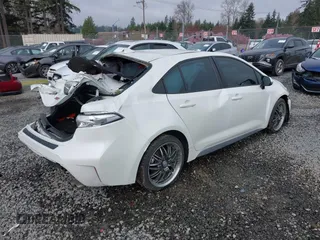 2021 Toyota Corolla XSE with VIN 5YFT4MCE8MP089733, listed as a IAAI auction lot 41826159 with 57,799 mi miles. Bid and sale history available at carsss.com. Image 4.