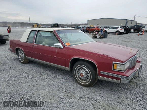 1987 Cadillac DeVille z VIN 1G6CD1181H4318101, wystawiony jako Copart lot #75354324 z przebiegiem Nie podano mil oraz Szkoda całkowita • Salvage title. Historia ofert i sprzedaży dostępna na DreamBid. Obrazek 4.