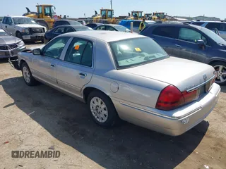 2005 Mercury Grand Marquis GS with VIN 2MEFM74W05X653375, listed as a IAAI auction lot 41995502 with 200,083 mi miles and . Bid and sale history available at DreamBid. Image 3.