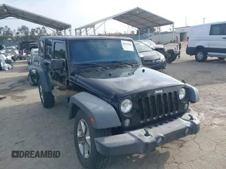 2015 Jeep Wrangler Unlimited Sport with VIN 1C4BJWDGXFL638750, listed as a IAAI auction lot 42550845 with 124,929 mi miles and . Bid and sale history available at DreamBid. Image 1.
