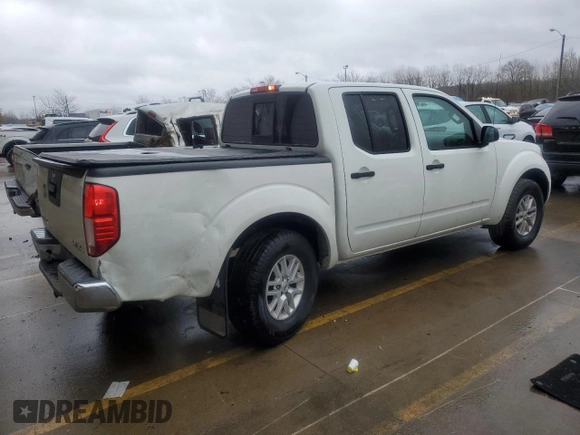 2015 Nissan Frontier S with VIN 1N6AD0EV9FN737834, listed as a Copart auction lot 85096904 with 101,683 mi miles and Salvage title. Bid and sale history available at DreamBid. Image 3.