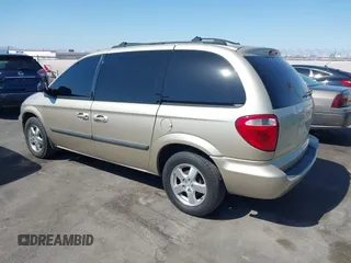 2005 Dodge Caravan SXT with VIN 1D4GP45R35B160641, listed as a IAAI auction lot 42132099 with 196,731 mi miles and . Bid and sale history available at carsss.com. Image 3.