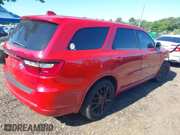 2015 Dodge Durango R/T with VIN 1C4SDJCT8FC176861, listed as a IAAI auction lot 42497150 with 84,792 mi miles and . Bid and sale history available at DreamBid. Image 4.
