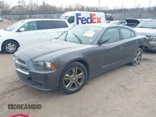 2014 Dodge Charger SXT Plus with VIN 2C3CDXJG0EH230635, listed as a IAAI auction lot 41890555 with 203,869 mi miles. Bid and sale history available at carsss.com. Image 17.