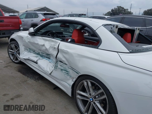 2018 BMW 4 Series 430i with VIN WBA4Z1C53JEC72907, listed as a IAAI auction lot 41436608 with 43,121 mi miles and . Bid and sale history available at carsss.com. Image 6.