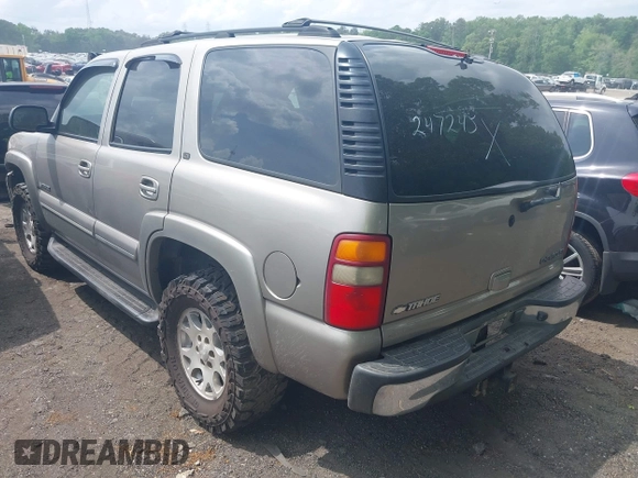 2003 Chevrolet Tahoe LT with VIN 1GNEC13Z73R247245, listed as a IAAI auction lot 42001442 with 263,939 mi miles. Bid and sale history available at carsss.com. Image 3.