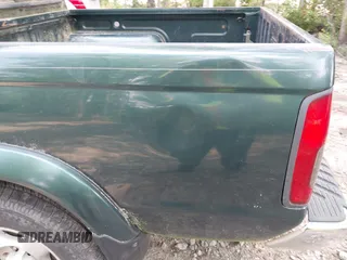 2000 Nissan Frontier XE z VIN 1N6ED27TXYC350670, wystawiony jako IAAI lot #42422277 z przebiegiem 192 897 mil mil oraz . Historia ofert i sprzedaży dostępna na DreamBid. Obrazek 6.