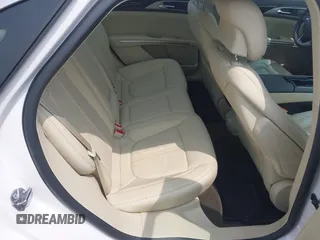 2015 Lincoln MKZ z VIN 3LN6L2G96FR625086, wystawiony jako IAAI lot #42406467 z przebiegiem 24 130 mil mil oraz . Historia ofert i sprzedaży dostępna na DreamBid. Obrazek 8.