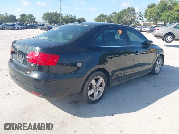 2013 Volkswagen Jetta TDI w/Premium with VIN 3VWLL7AJ6DM438641, listed as a IAAI auction lot 42724848 with Not provided miles and . Bid and sale history available at DreamBid. Image 4.