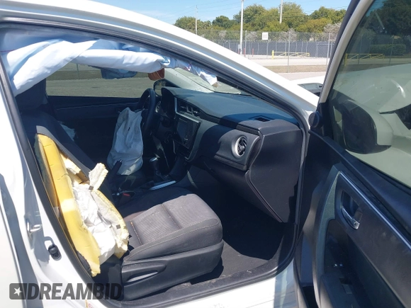 2019 Toyota Corolla L with VIN 5YFBURHE0KP882524, listed as a IAAI auction lot 41862382 with 84,981 mi miles. Bid and sale history available at carsss.com. Image 5.
