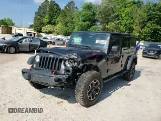 2016 Jeep Wrangler Unlimited Rubicon Hard Rock z VIN 1C4BJWFG6GL125252, wystawiony jako Copart lot #55241115 z przebiegiem 193 554 mil mil oraz Szkoda całkowita • Salvage title. Historia ofert i sprzedaży dostępna na DreamBid. Obrazek 13.