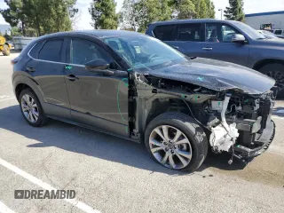 2020 Mazda CX-30 Select with VIN 3MVDMACL5LM111970, listed as a Copart auction lot 47116665 with Not provided miles and Salvage title. Bid and sale history available at DreamBid. Image 4.