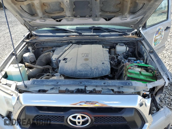 2015 Toyota Tacoma with VIN 3TMLU4EN2FM179631, listed as a Copart auction lot 57769855 with 106,288 mi miles and Salvage title. Bid and sale history available at DreamBid. Image 11.