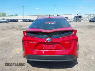 2021 Toyota Prius LE with VIN JTDKAMFP6M3192515, listed as a IAAI auction lot 42302003 with 74,247 mi miles and . Bid and sale history available at DreamBid. Image 16.