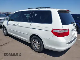 2005 Honda Odyssey EX with VIN 5FNRL38465B081716, listed as a IAAI auction lot 41998956 with 173,182 mi miles and . Bid and sale history available at carsss.com. Image 3.