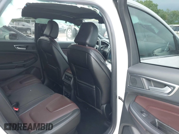 2021 Ford Edge Titanium with VIN 2FMPK4K96MBA18546, listed as a IAAI auction lot 42584326 with 65,214 mi miles and . Bid and sale history available at DreamBid. Image 8.