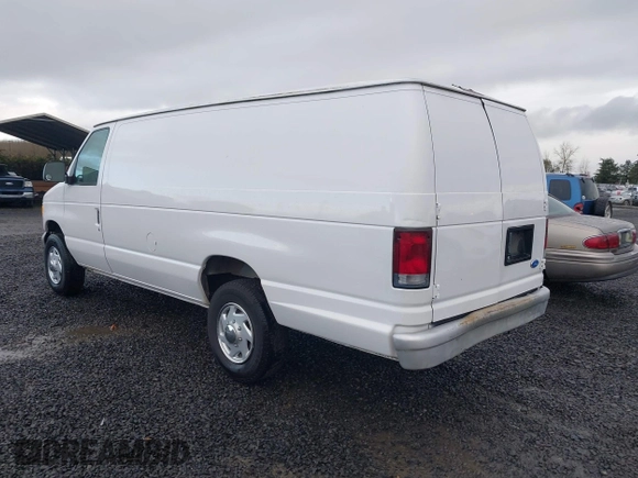 1996 Ford Econoline Cargo with VIN 1FTJS34H4THA69893, listed as a IAAI auction lot 41703257 with 206,503 mi miles and . Bid and sale history available at DreamBid. Image 3.