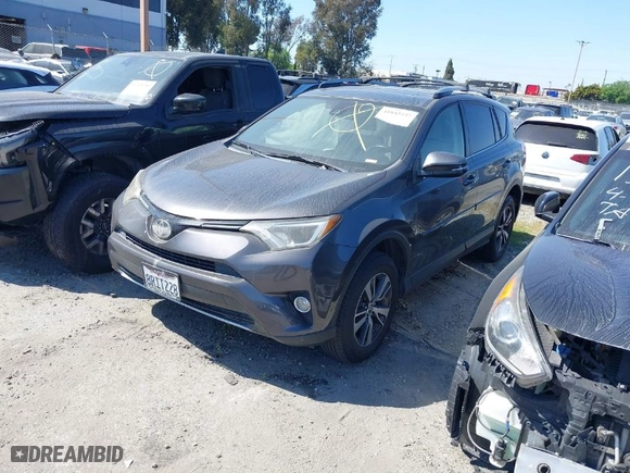 2018 Toyota RAV4 XLE with VIN JTMWFREV4JJ168138, listed as a IAAI auction lot 41845337 with 122,509 mi miles. Bid and sale history available at carsss.com. Image 2.