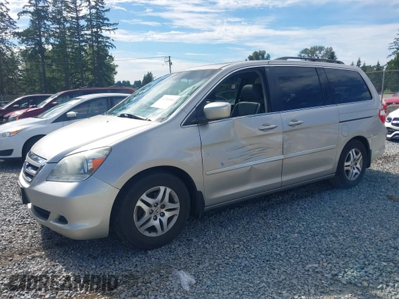 2006 Honda Odyssey EX-L z VIN 5FNRL38726B428227, wystawiony jako IAAI lot #42381464 z przebiegiem 156 623 mil mil oraz . Historia ofert i sprzedaży dostępna na DreamBid. Obrazek 18.