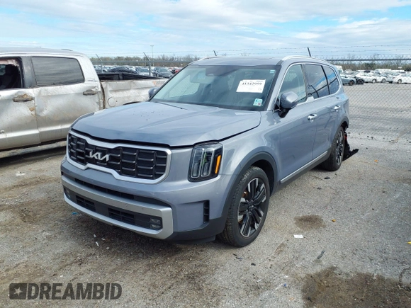 2023 Kia Telluride SX with VIN 5XYP54GC5PG369223, listed as a IAAI auction lot 41342959 with 19,237 mi miles and . Bid and sale history available at DreamBid. Image 2.