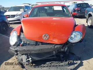2019 Volkswagen Beetle S with VIN 3VWFD7AT7KM719940, listed as a IAAI auction lot 41190839 with 77,627 mi miles. Bid and sale history available at carsss.com. Image 13.