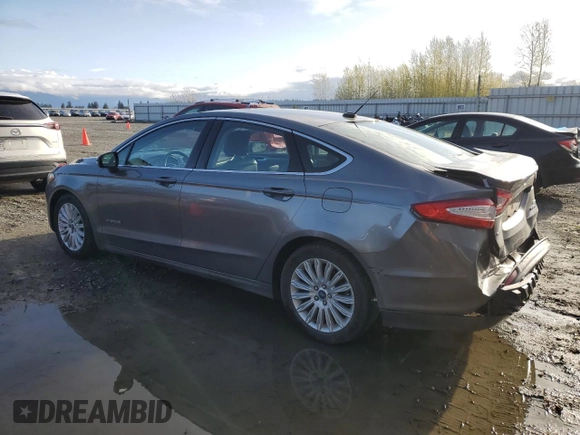 2013 Ford Fusion SE Hybrid with VIN 3FA6P0LU8DR184555, listed as a Copart auction lot 52108905 with 80,505 mi miles and Salvage Title. Bid and sale history available at DreamBid. Image 2.