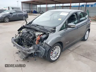 2013 Ford C-Max SEL z VIN 1FADP5BUXDL526768, wystawiony jako IAAI lot #42357018 z przebiegiem 149 659 mil mil oraz . Historia ofert i sprzedaży dostępna na DreamBid. Obrazek 2.