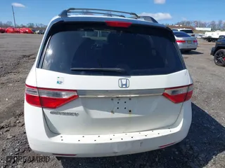 2011 Honda Odyssey EX-L with VIN 5FNRL5H69BB084277, listed as a IAAI auction lot 41986692 with 273,272 mi miles. Bid and sale history available at carsss.com. Image 16.