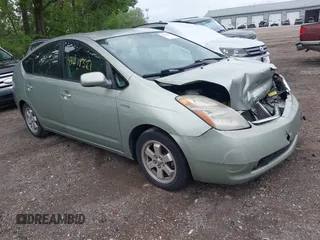 2007 Toyota Prius z VIN JTDKB20U977680337, wystawiony jako IAAI lot #42318321 z przebiegiem 186 903 mil mil oraz . Historia ofert i sprzedaży dostępna na DreamBid. Obrazek 1.
